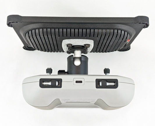 A drone pilot using the iPad Cooling Case with the DJI Controller
