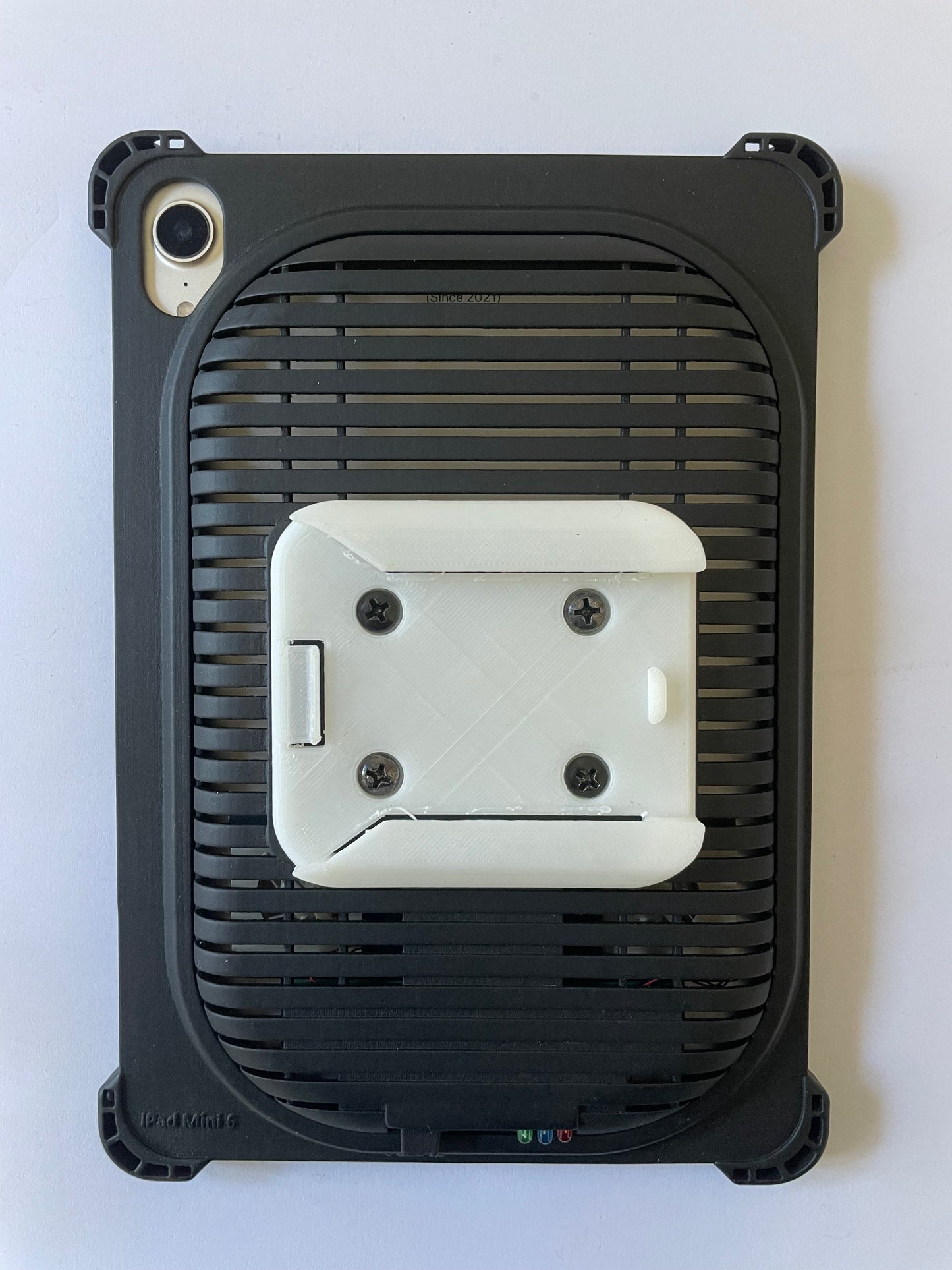 3D printed Pivot Adapter attached to iPad mini cooling case