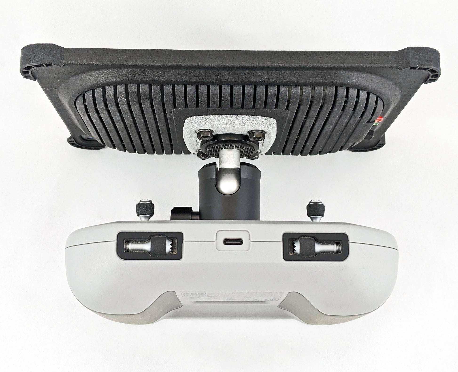 An iPad Cooling Case secured onto a Mavmount on a DJI Mini 2 Controller using the WWMM Adapter